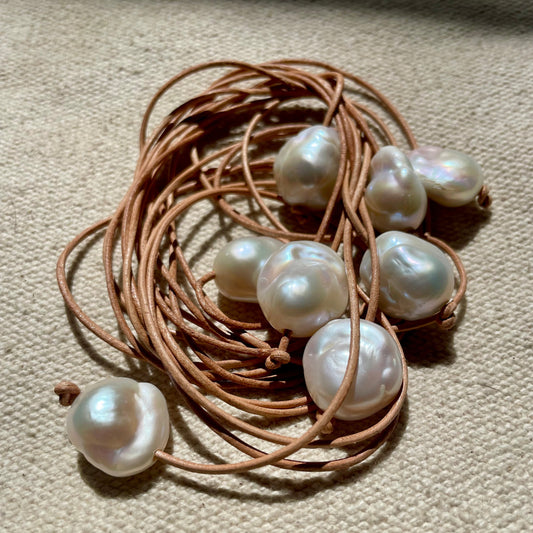 Leather cord with two fresh water pearls